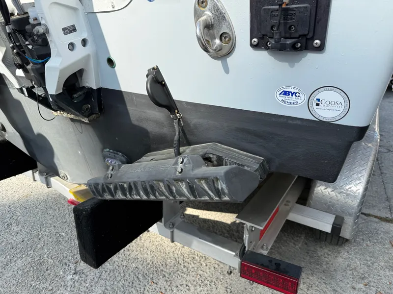 Slide: The Image of Rear view of a 2025 Sea Hunt Ultra 275 SE boat. - 6