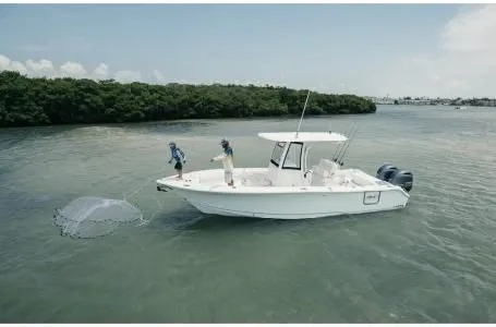 Slide: The Image of 2022 Sea Hunt Gamefish 25 fishing on calm waters. - 10