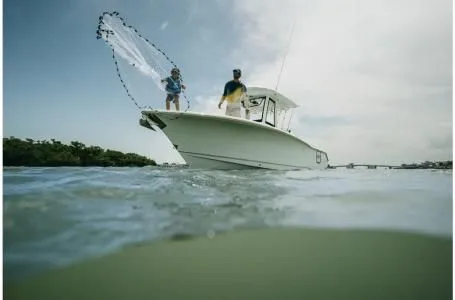 Slide: The Image of 2022 Sea Hunt Gamefish 25 fishing on the water. - 7
