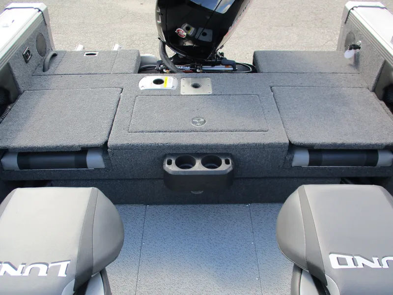 Slide: The Image of Interior of 2026 Lund 1875 Tyee with gray carpeted flooring. - 10