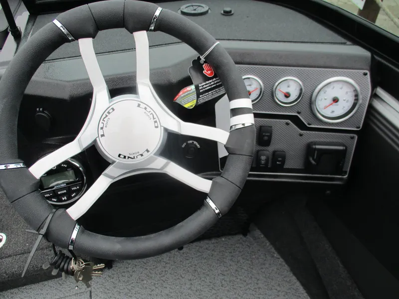 Slide: The Image of Steering wheel and dashboard of the 2026 Lund 1875 Tyee. - 5