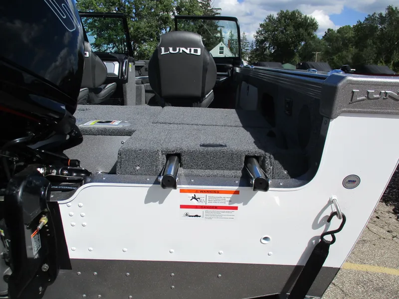 Slide: The Image of Interior of 2026 Lund 1875 Tyee boat with seat and motor. - 7