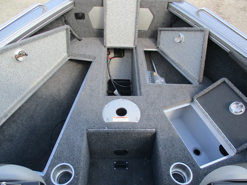 Slide: The Image of Interior of 2026 Lund 1875 Tyee with storage compartments and cup holders. - 9