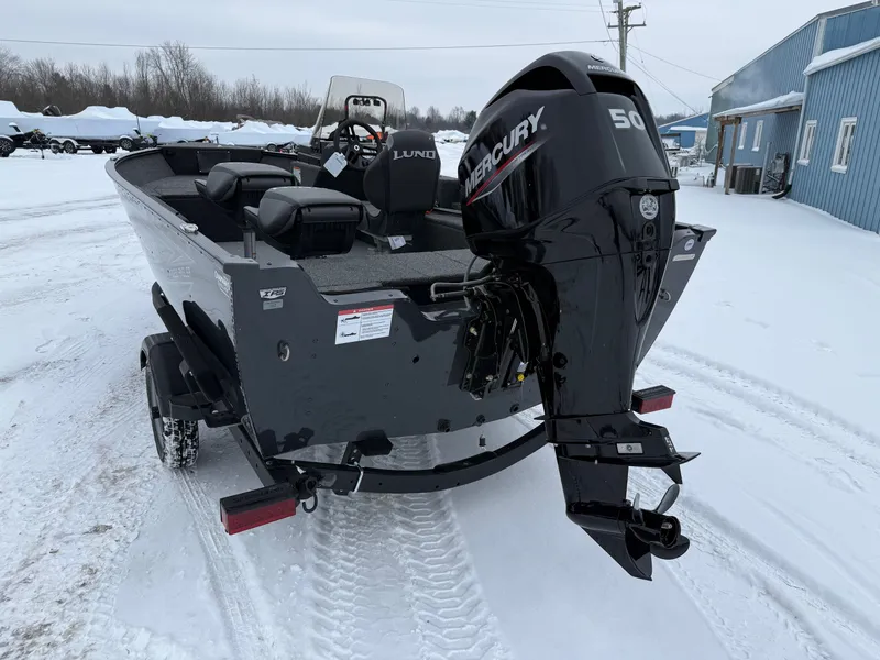 Slide: The Image of 2026 Lund 1650 Angler SS boat with Mercury 50 engine in snow. - 4