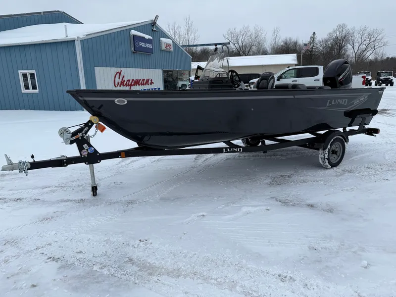 Slide: The Image of 2026 Lund 1650 Angler SS boat on trailer in snow. - 7