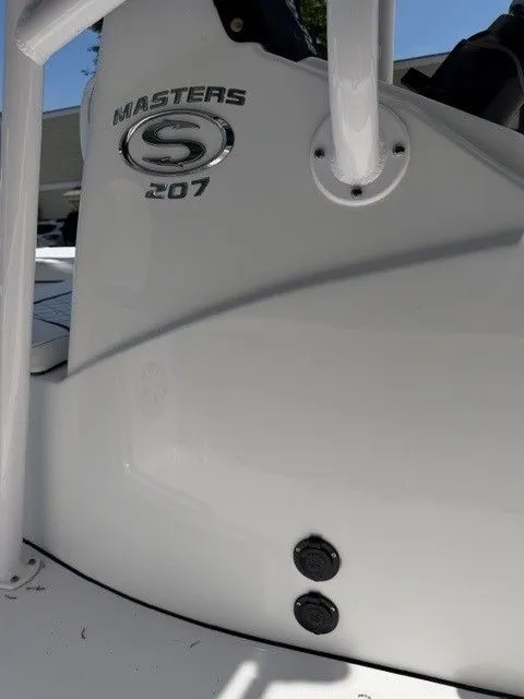 Slide: The Image of 2022 Sportsman Masters 207 boat, close-up of logo. - 10