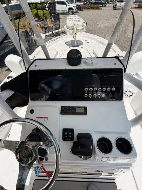 Slide: The Image of Control console of a 2022 Sportsman Masters 207 boat. - 19