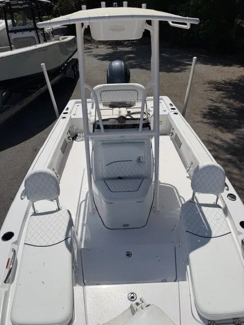 Slide: The Image of 2022 Sportsman Masters 207 boat, interior view with seating and helm station. - 26