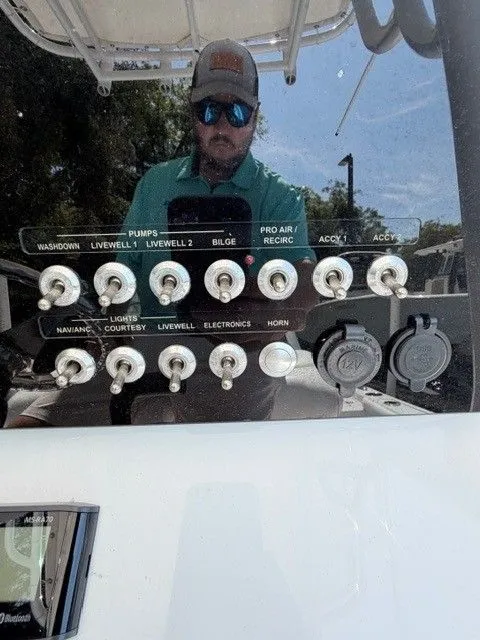 Slide: The Image of Control panel of a 2022 Sportsman Masters 207 boat. - 4