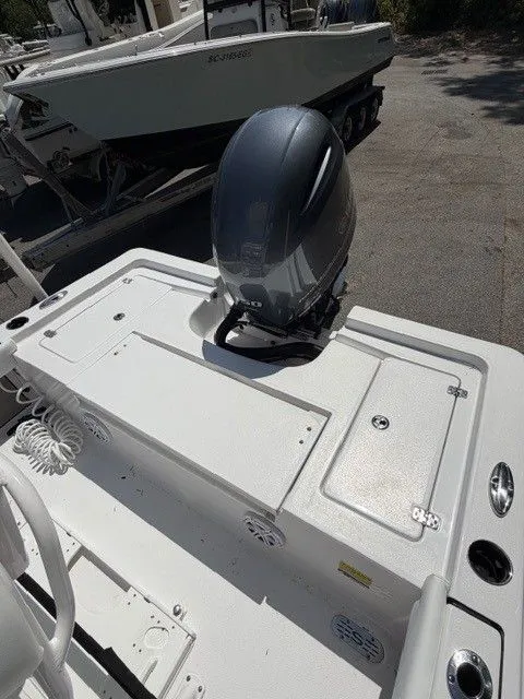 Slide: The Image of 2022 Sportsman Masters 207 boat with outboard motor. - 5