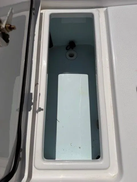 Slide: The Image of Open storage compartment in Sportsman Masters 207 boat, year 2022. - 6