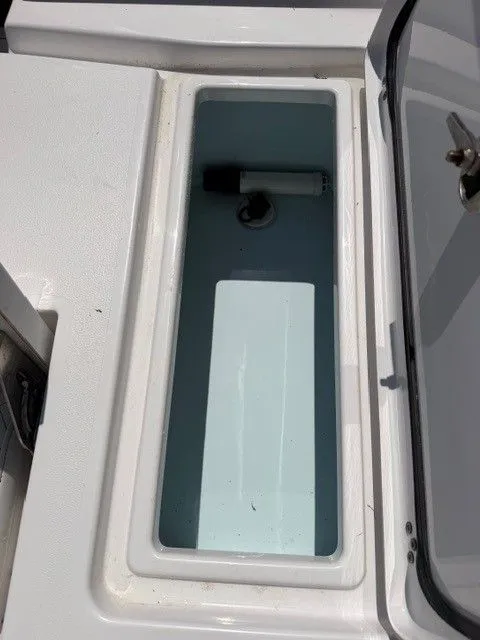 Slide: The Image of Interior view of a 2022 Sportsman Masters 207 boat compartment. - 8