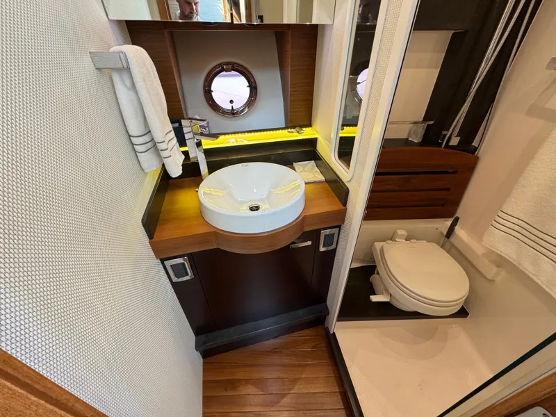 Slide: The Image of Luxurious bathroom on a 2018 Tiara Yachts C44. - 19