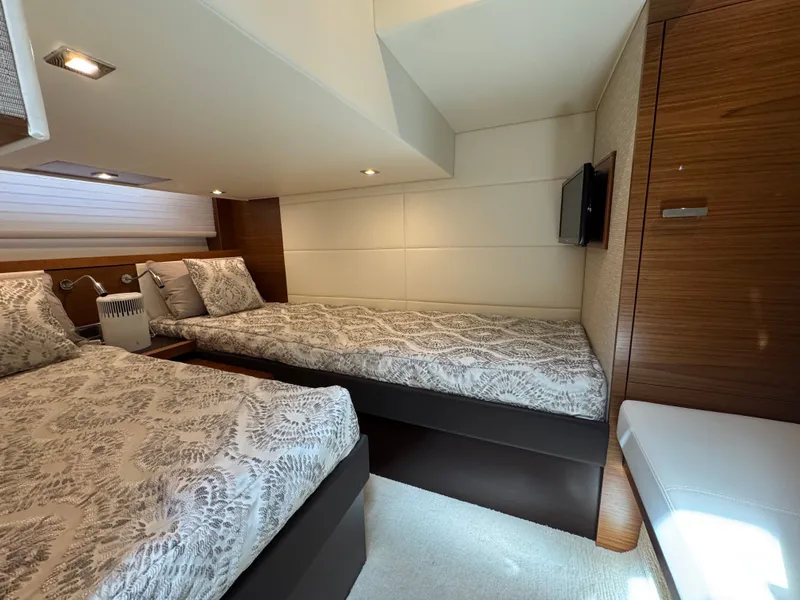 Slide: The Image of Interior of 2018 Tiara Yachts C44 featuring twin beds. - 21
