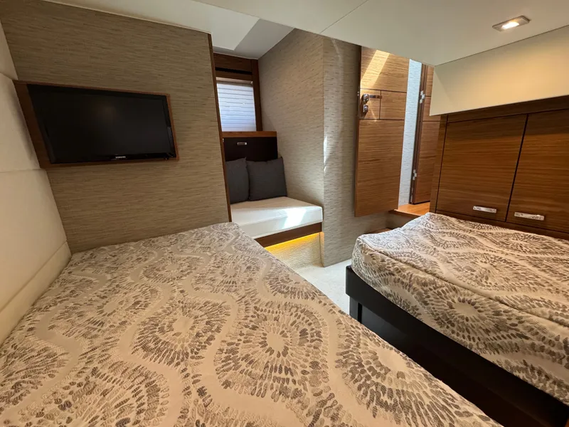 Slide: The Image of Interior of 2018 Tiara Yachts C44 with twin beds. - 22