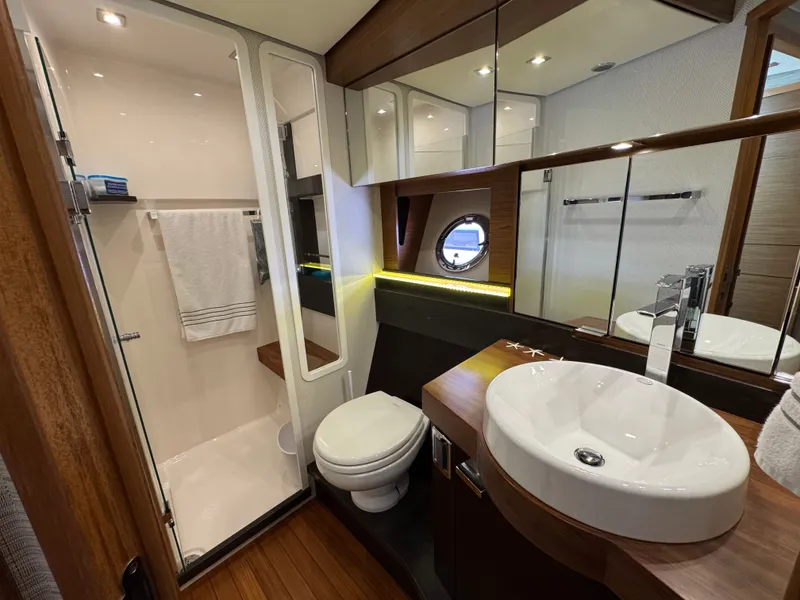 Slide: The Image of Luxurious bathroom on a 2018 Tiara Yachts C44. - 24