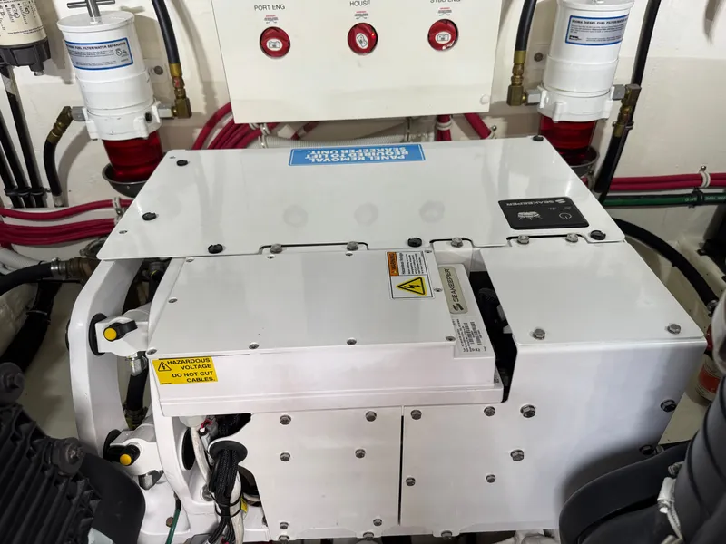 Slide: The Image of Engine room of 2018 Tiara Yachts C44 with Seakeeper stabilizer. - 29