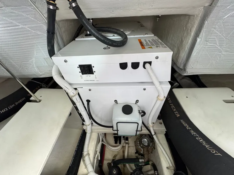 Slide: The Image of Engine room of 2018 Tiara Yachts C44 with technical components. - 30