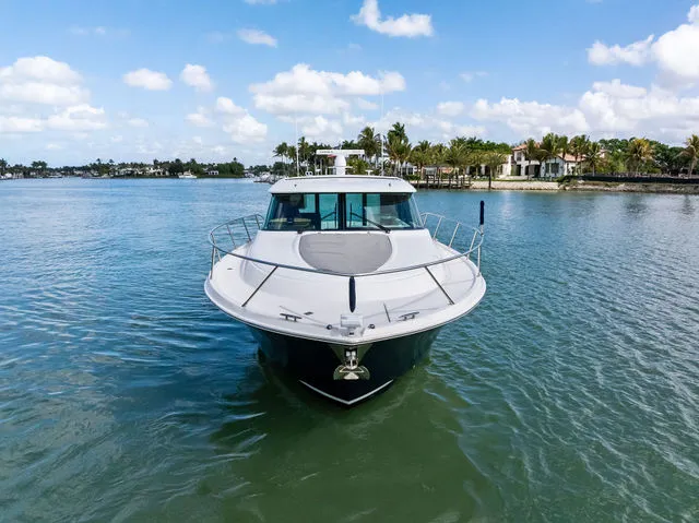 Slide: The Image of 2018 Tiara Yachts C44 with open grill on deck. - 6