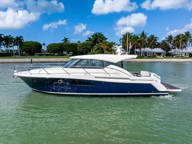 Slide: The Image of 2018 Tiara Yachts C44 docked, sleek design. - 3