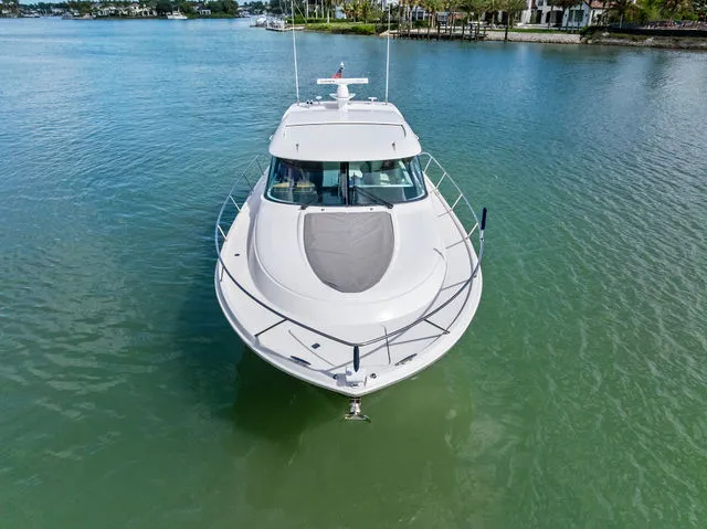 Slide: The Image of Interior of 2018 Tiara Yachts C44 featuring elegant seating area. - 7