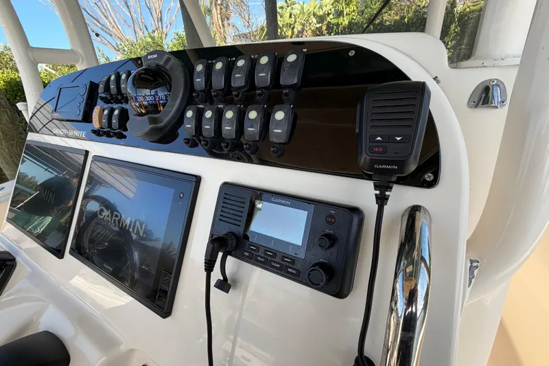 Slide: The Image of Control panel of 2018 Grady-White Canyon 306 boat with Garmin electronics. - 25
