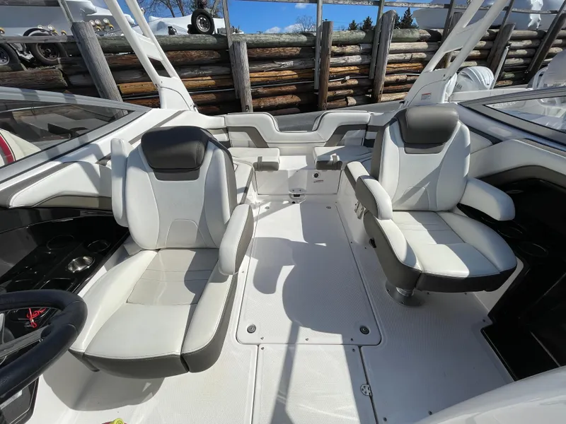 Slide: The Image of Interior of a 2015 Yamaha 242 Limited S boat with two seats. - 10