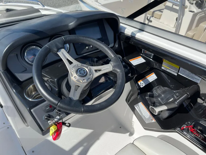 Slide: The Image of Yamaha Boats 2015 242 Limited S steering console with wheel and instruments. - 11