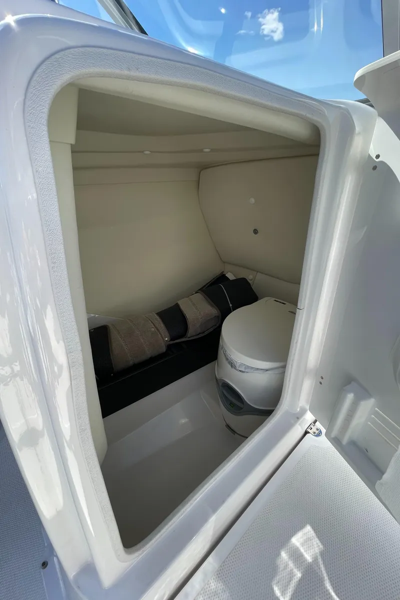 Slide: The Image of Interior of 2015 Yamaha 242 Limited S with toilet. - 15