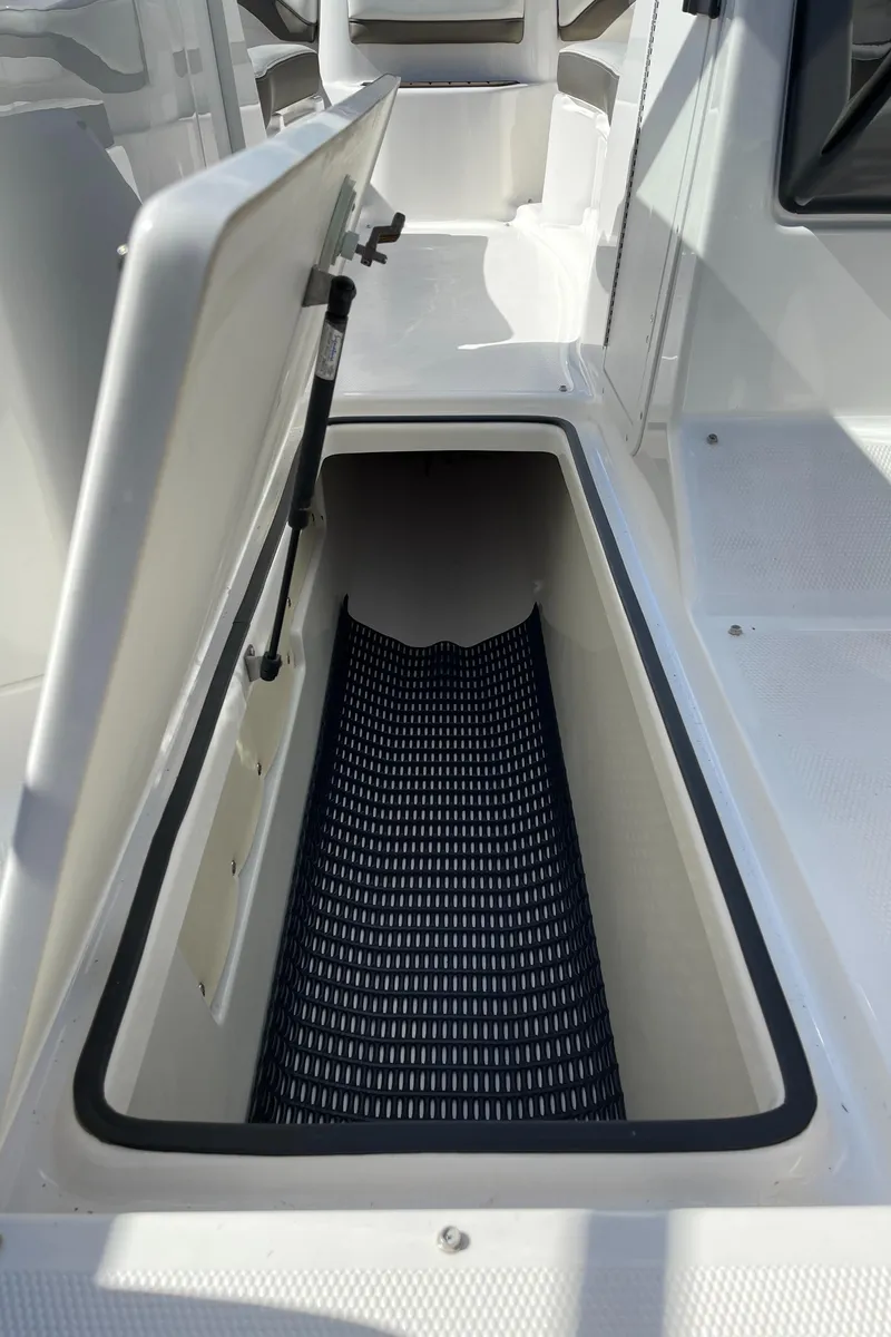 Slide: The Image of Storage compartment in Yamaha Boats 242 Limited S 2015 model. - 16