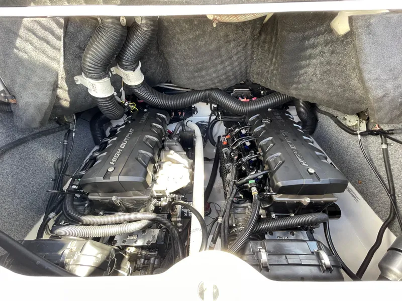 Slide: The Image of Engine compartment of 2015 Yamaha Boats 242 Limited S with dual engines. - 20