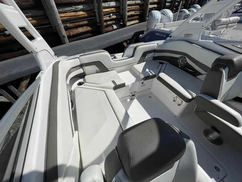 Slide: The Image of Interior of a 2015 Yamaha Boats 242 Limited S with gray seating. - 9