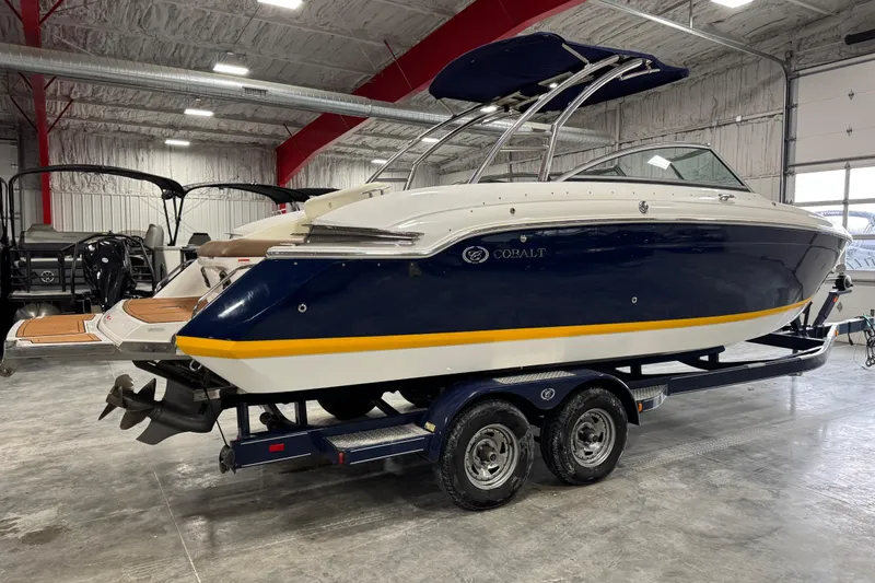 Slide: The Image of 2014 Cobalt 276 boat on trailer in indoor storage facility. - 4