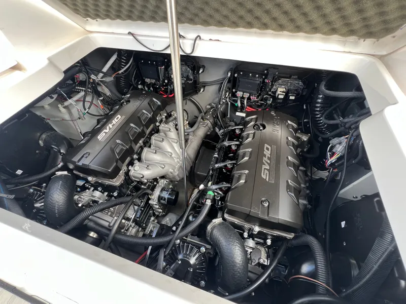 Slide: The Image of Engine compartment of 2023 Yamaha Boats 255 FSH Sport E with SVHO engines. - 28