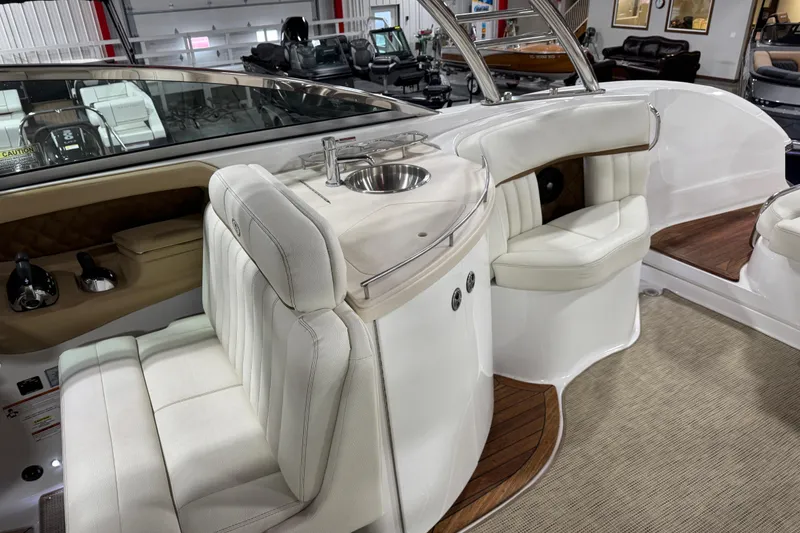 Slide: The Image of Luxurious interior of a 2019 Cobalt R35 boat with plush seating and a built-in sink. - 10
