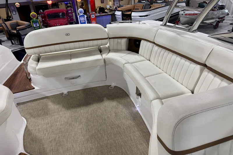 Slide: The Image of Luxurious seating area on a 2019 Cobalt R35 boat, featuring white leather upholstery. - 11