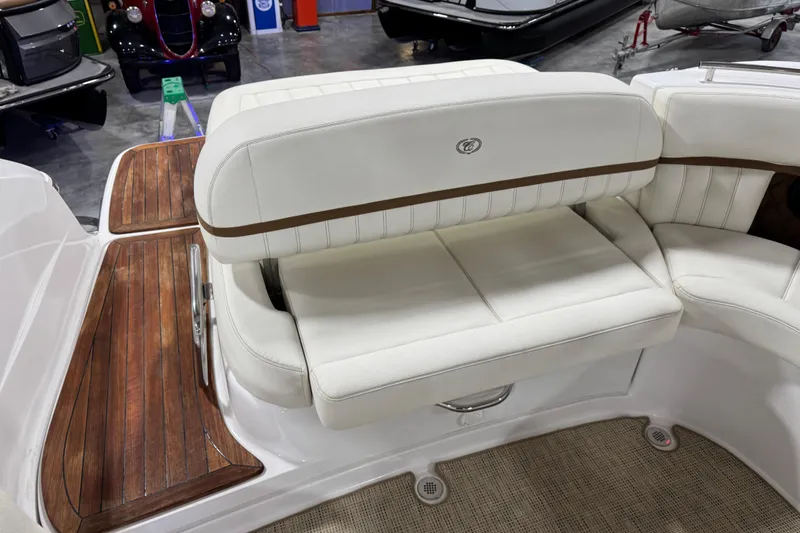 Slide: The Image of Luxurious seating on 2019 Cobalt R35 boat with elegant wood flooring. - 6