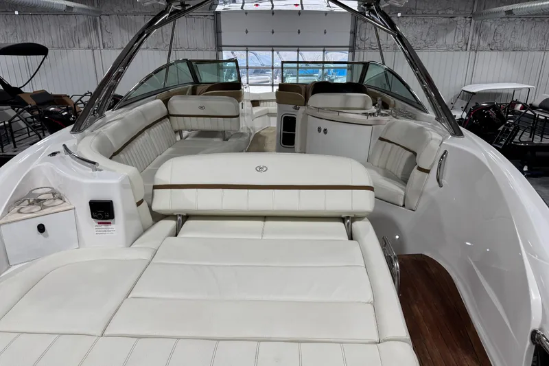 Slide: The Image of 2019 Cobalt R35 boat interior with luxurious white seating and sleek design. - 8
