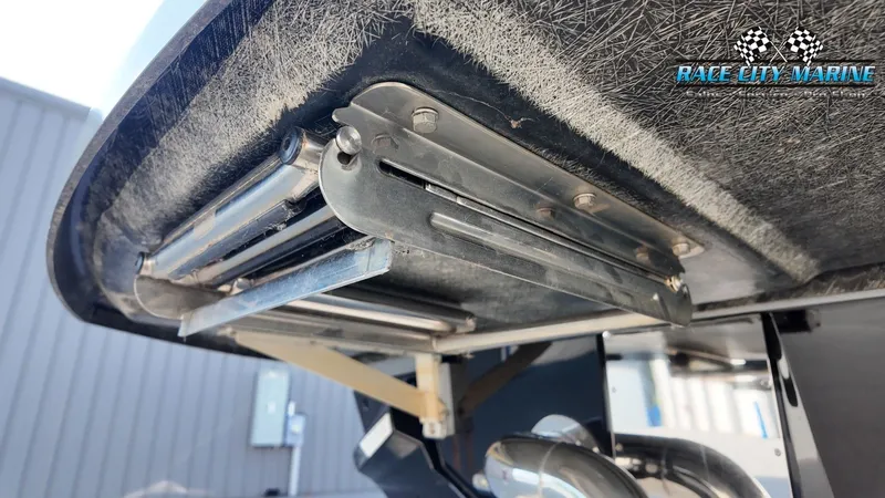 Slide: The Image of Close-up of a boat part with metal components and an exhaust pipe. - 9
