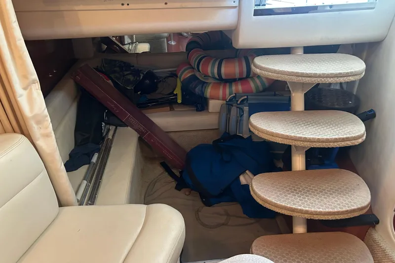Slide: The Image of Interior cabin of 2003 Sea Ray 340 Sundancer with steps and storage items. - 20