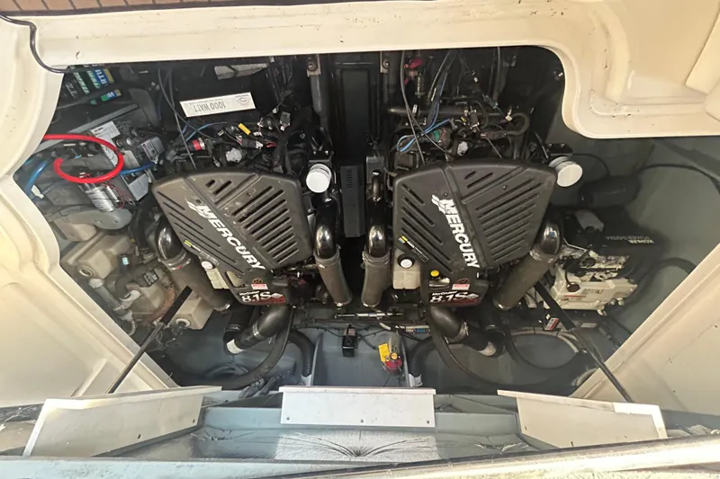 Slide: The Image of Engine compartment of a 2003 Sea Ray 340 Sundancer with twin Mercury engines. - 22