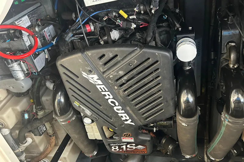 Slide: The Image of Engine compartment of a 2003 Sea Ray 340 Sundancer with Mercury 8.1S Horizon engine. - 23