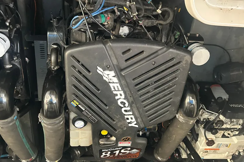 Slide: The Image of Engine compartment of a 2003 Sea Ray 340 Sundancer with Mercury 8.1S Horizon engine. - 24