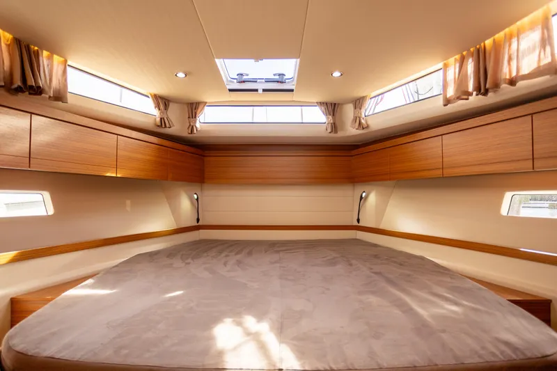 Slide: The Image of Luxurious interior cabin of 2024 Greenline 39 yacht with elegant wood finish. - 21