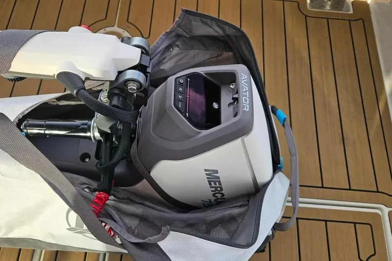 Slide: The Image of Electric outboard motor on Greenline 39 yacht, 2024 model, on teak deck. - 28