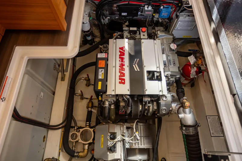 Slide: The Image of Engine compartment of 2024 Greenline 39 yacht featuring a Yanmar engine. - 30