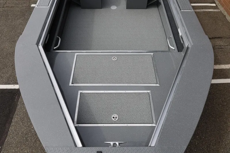Slide: The Image of 2026 Thunder Jet 209 Rush OT boat deck with storage compartments, gray finish. - 17