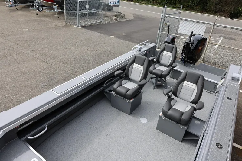 Slide: The Image of 2026 Thunder Jet 209 Rush OT boat interior with four seats and outboard motor. - 18