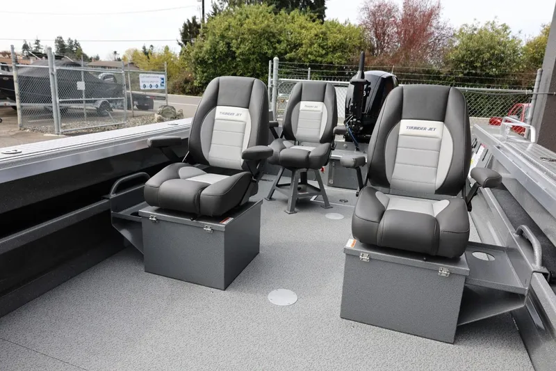 Slide: The Image of 2026 Thunder Jet 209 Rush OT boat interior with three cushioned seats. - 23