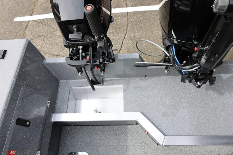 Slide: The Image of 2026 Thunder Jet 209 Rush OT boat engine compartment, featuring dual outboard motors. - 39